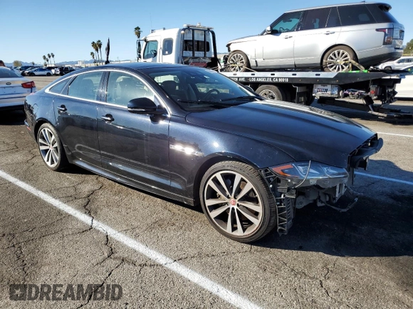 2018 Jaguar XJ with VIN SAJWA1C79J8W14555, listed as a Copart auction lot 39950303 with 86,316 mi miles. Bid and sale history available at carsss.com. Image 4.