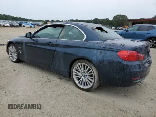 2014 BMW 4 Series 435i with VIN WBA3T3C53EP737301, listed as a Copart auction lot 57352985 with Not provided miles and Salvage title. Bid and sale history available at DreamBid. Image 2.