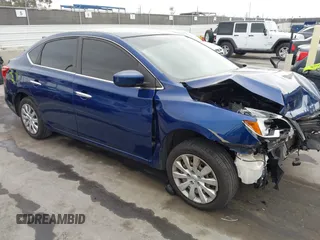 2018 Nissan Sentra S z VIN 3N1AB7AP0JY325857, wystawiony jako IAAI lot #42369923 z przebiegiem 100 895 mil mil oraz . Historia ofert i sprzedaży dostępna na DreamBid. Obrazek 1.