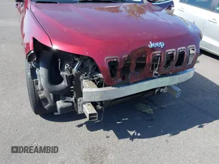2019 Jeep Cherokee Latitude Plus z VIN 1C4PJMLX0KD346993, wystawiony jako IAAI lot #42373990 z przebiegiem 92 213 mil mil oraz . Historia ofert i sprzedaży dostępna na DreamBid. Obrazek 19.