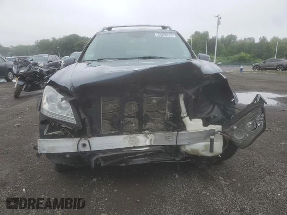 2012 Mercedes-Benz GL 450 z VIN 4JGBF7BE1CA795000, wystawiony jako Copart lot #60209055 z przebiegiem 167 244 mil mil oraz Szkoda całkowita • Salvage title. Historia ofert i sprzedaży dostępna na DreamBid. Obrazek 5.
