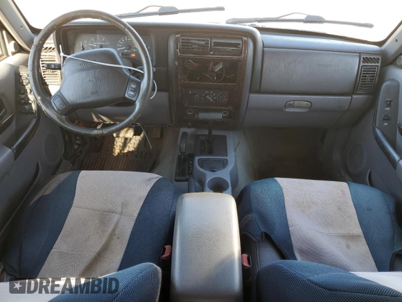 1997 Jeep Cherokee Country with VIN 1J4FJ78S2VL574492, listed as a Copart auction lot 88568685 with 244,465 mi miles and Salvage Title. Bid and sale history available at carsss.com. Image 8.