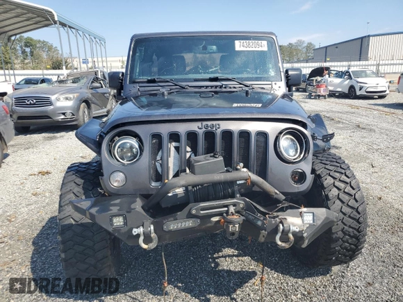 2018 Jeep Wrangler JK Unlimited Sport S with VIN 1C4BJWDG0JL842059, listed as a Copart auction lot 74382094 with 63,373 mi miles and Salvage Title. Bid and sale history available at carsss.com. Image 5.