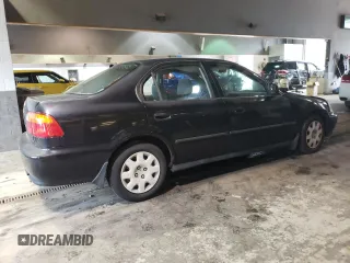 2000 Honda Civic LX with VIN JHMEJ6670YS002114, listed as a Copart auction lot 49373834 with 263,679 mi miles and Salvage Title. Bid and sale history available at DreamBid. Image 3.