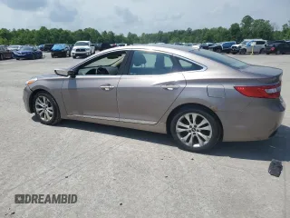 2013 Hyundai Azera z VIN KMHFG4JG4DA240690, wystawiony jako Copart lot #57465565 z przebiegiem 164 757 mil mil oraz Szkoda całkowita • Salvage title. Historia ofert i sprzedaży dostępna na DreamBid. Obrazek 2.