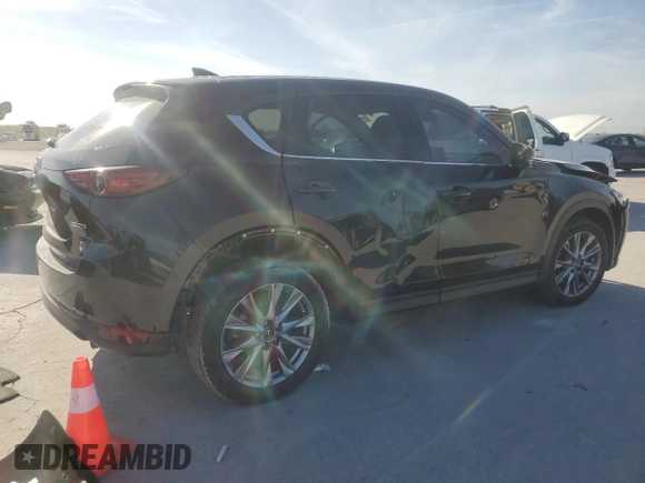2021 Mazda CX-5 Grand Touring with VIN JM3KFADM2M0390669, listed as a Copart auction lot 53540805 with 150,092 mi miles and Clean Title. Bid and sale history available at carsss.com. Image 3.