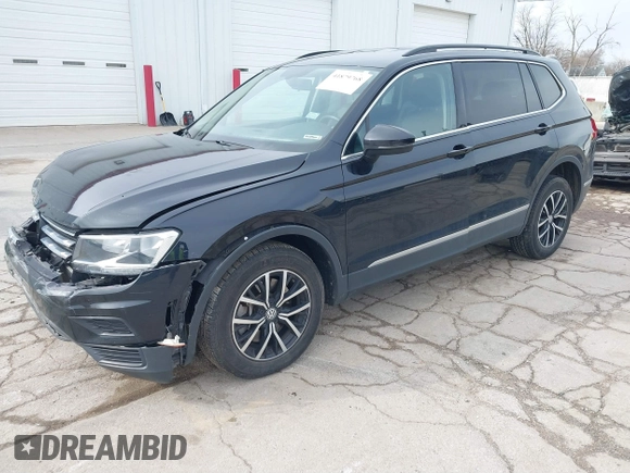 2021 Volkswagen Tiguan SE with VIN 3VV2B7AXXMM057849, listed as a IAAI auction lot 41879768 with 88,353 mi miles and . Bid and sale history available at DreamBid. Image 2.
