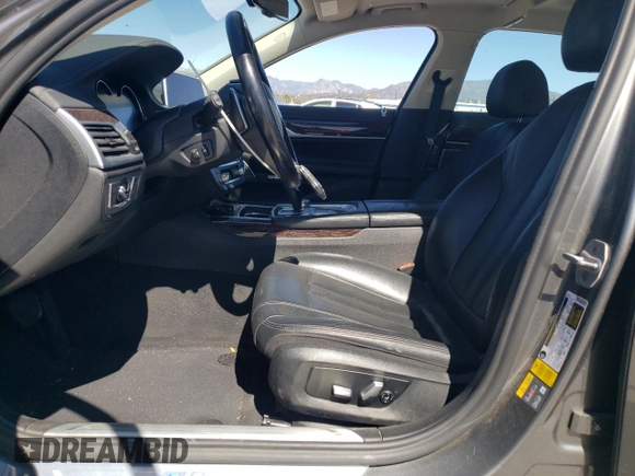 2018 BMW 7 Series 740e xDrive with VIN WBA7J2C55JG938385, listed as a Copart auction lot 49109985 with 81,567 mi miles and Salvage Title. Bid and sale history available at DreamBid. Image 7.