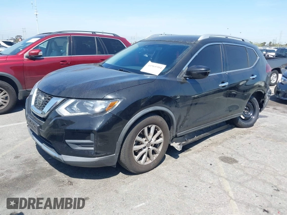 2019 Nissan Rogue SV with VIN KNMAT2MT8KP506083, listed as a IAAI auction lot 41965304 with 99,872 mi miles and . Bid and sale history available at DreamBid. Image 2.