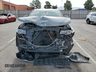2017 Jeep Grand Cherokee Laredo with VIN 1C4RJEAG6HC614543, listed as a Copart auction lot 55804605 with 89,730 mi miles and Salvage title. Bid and sale history available at DreamBid. Image 5.