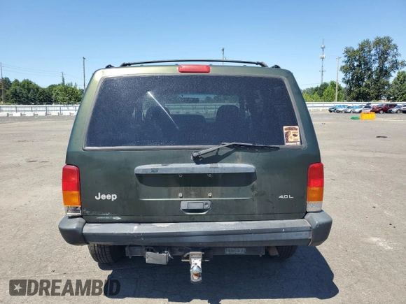 1998 Jeep Cherokee Sport with VIN 1J4FJ68S5WL108020, listed as a Copart auction lot 60150655 with 290,595 mi miles and Salvage title. Bid and sale history available at DreamBid. Image 6.