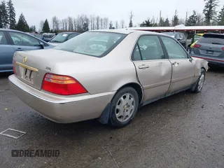 2000 Acura RL w/Navigation System with VIN JH4KA9662YC001438, listed as a IAAI auction lot 41522017 with 169,129 mi miles. Bid and sale history available at carsss.com. Image 4.