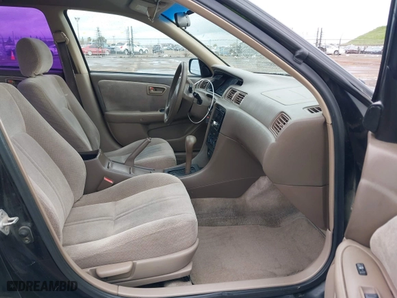 2000 Toyota Camry CE with VIN JT2BG22KXY0432288, listed as a IAAI auction lot 41927856 with 203,035 mi miles. Bid and sale history available at carsss.com. Image 5.