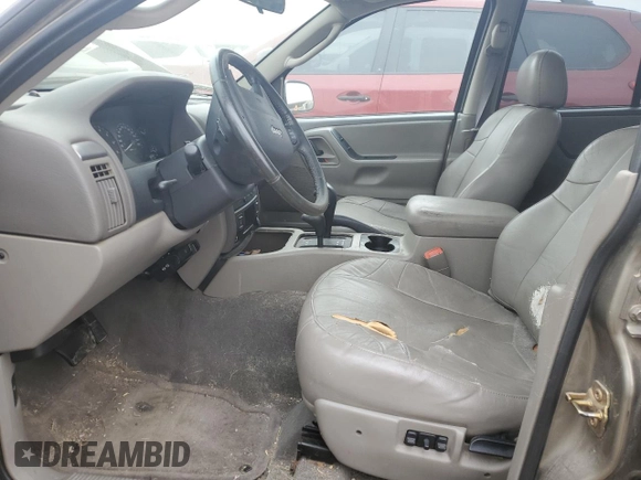2004 Jeep Grand Cherokee Laredo with VIN 1J4GW48N94C408435, listed as a Copart auction lot 83909444 with Not provided miles and Clean title. Bid and sale history available at DreamBid. Image 7.