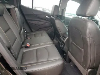 2021 Chevrolet Equinox Premier z VIN 2GNAXNEV9M6136701, wystawiony jako Copart lot #57288215 z przebiegiem 62 808 mil mil oraz Szkoda całkowita • Salvage title. Historia ofert i sprzedaży dostępna na DreamBid. Obrazek 10.