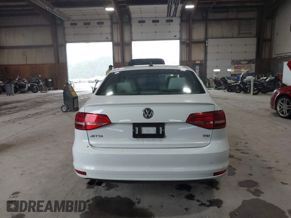 2015 Volkswagen Jetta SE z VIN 3VWD17AJ2FM427343, wystawiony jako IAAI lot #42520443 z przebiegiem 60 409 mil mil oraz . Historia ofert i sprzedaży dostępna na DreamBid. Obrazek 16.