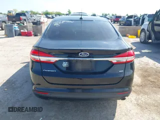 2018 Ford Fusion SE z VIN 3FA6P0H74JR125761, wystawiony jako IAAI lot #41992708 z przebiegiem 102 242 mil mil oraz . Historia ofert i sprzedaży dostępna na DreamBid. Obrazek 16.