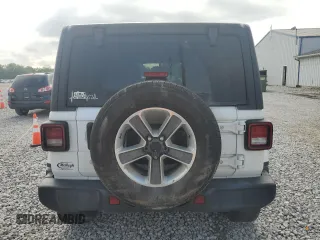 2019 Jeep Wrangler Unlimited Sahara с VIN 1C4HJXEG6KW580031, выставлен на аукционе Copart как лот 59687835 с пробегом 136 590 миль миль и Списание • Salvage title. История ставок и продаж доступна на DreamBid. Изображение 6.