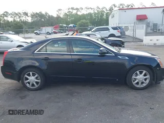 2008 Cadillac CTS RWD with VIN 1G6DF577680167610, listed as a IAAI auction lot 42595266 with 65,383 mi miles and . Bid and sale history available at DreamBid. Image 13.