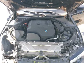 2019 BMW 3 Series 330i with VIN WBA5R1C51KFH09402, listed as a IAAI auction lot 41869138 with 59,115 mi miles and . Bid and sale history available at DreamBid. Image 10.