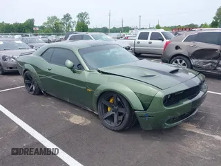 2021 Dodge Challenger R/T Scat Pack z VIN 2C3CDZFJ2MH559741, wystawiony jako IAAI lot #42264991 z przebiegiem 51 040 mil mil oraz . Historia ofert i sprzedaży dostępna na DreamBid. Obrazek 1.