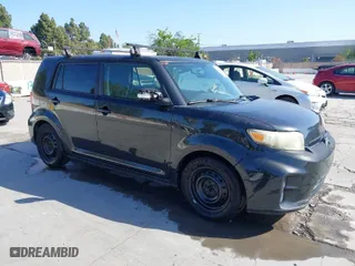2012 Scion xB with VIN JTLZE4FE4C1143412, listed as a IAAI auction lot 42091929 with 213,501 mi miles. Bid and sale history available at carsss.com. Image 1.