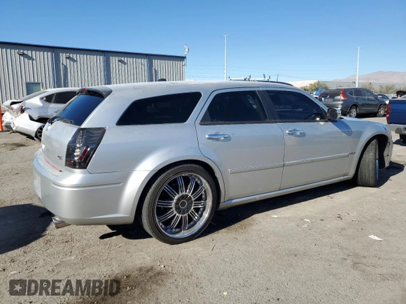 2006 Dodge Magnum R/T z VIN 2D8GV57286H122762, wystawiony jako Copart lot #83399984 z przebiegiem 200 443 mil mil oraz Szkody całkowita. Historia ofert i sprzedaży dostępna na DreamBid. Obrazek 3.