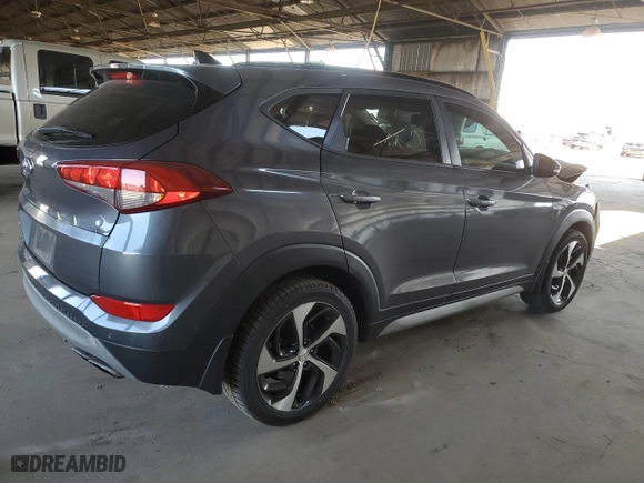 2018 Hyundai Tucson Value with VIN KM8J33A23JU823248, listed as a Copart auction lot 42967005 with 107,295 mi miles and Salvage Title. Bid and sale history available at carsss.com. Image 3.