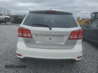 2013 Dodge Journey SE z VIN 3C4PDCAB5DT695315, wystawiony jako Copart lot #49158735 z przebiegiem 165 093 mil mil oraz Szkoda całkowita • Salvage title. Historia ofert i sprzedaży dostępna na DreamBid. Obrazek 6.