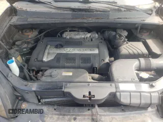 2005 Hyundai Tucson GL with VIN KM8JM12BX5U075930, listed as a Copart auction lot 67500484 with 141,028 mi miles and Salvage Title. Bid and sale history available at carsss.com. Image 12.
