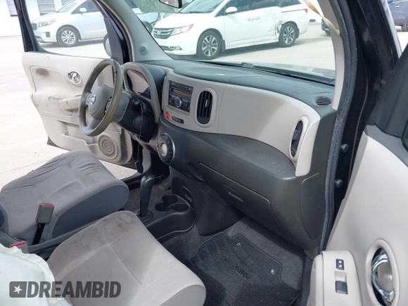 2009 Nissan Cube SL z VIN JN8AZ28R59T103584, wystawiony jako IAAI lot #41685022 z przebiegiem 158 810 mil mil oraz . Historia ofert i sprzedaży dostępna na DreamBid. Obrazek 5.