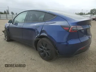 2024 Tesla Model Y with VIN 7SAYGDED3RF118546, listed as a Copart auction lot 56573375 with 4,760 mi miles and Salvage title. Bid and sale history available at DreamBid. Image 2.