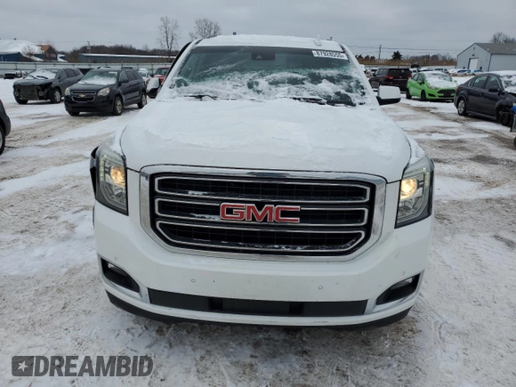 2020 GMC Yukon SLT with VIN 1GKS2BKC1LR280389, listed as a Copart auction lot 87928555 with 84,242 mi miles and Salvage Title. Bid and sale history available at carsss.com. Image 5.