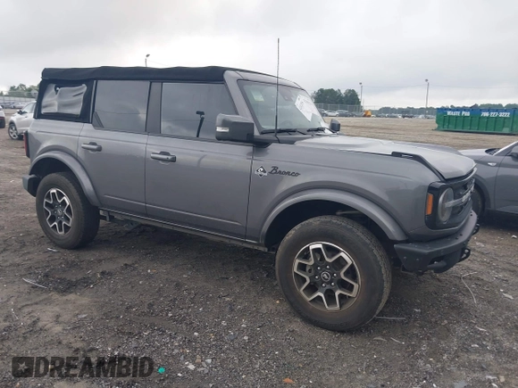 2021 Ford Bronco with VIN 1FMDE5DH9MLA62853, listed as a IAAI auction lot 42413256 with 65,000 mi miles and . Bid and sale history available at DreamBid. Image 1.