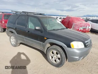 2001 Mazda Tribute LX with VIN 4F2CU08191KM27990, listed as a IAAI auction lot 41487001 with 209,394 mi miles and . Bid and sale history available at carsss.com. Image 1.