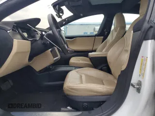 2016 Tesla Model S 90D with VIN 5YJSA1E26GF133699, listed as a Copart auction lot 62703535 with Not provided miles and Salvage title. Bid and sale history available at DreamBid. Image 7.