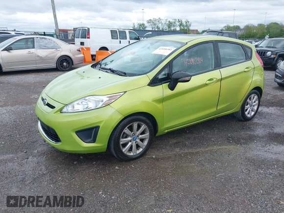 2013 Ford Fiesta SE with VIN 3FADP4EJ7DM136723, listed as a IAAI auction lot 42090284 with 168,004 mi miles and . Bid and sale history available at DreamBid. Image 2.