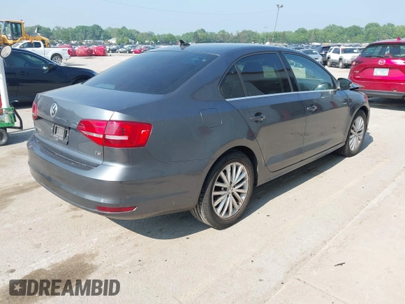 2015 Volkswagen Jetta SE with VIN 3VWD07AJ2FM310154, listed as a IAAI auction lot 42456136 with 96,979 mi miles and . Bid and sale history available at DreamBid. Image 4.