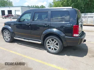 2011 Dodge Nitro Heat z VIN 1D4PU4GK1BW554538, wystawiony jako IAAI lot #42502621 z przebiegiem 141 142 mil mil oraz . Historia ofert i sprzedaży dostępna na DreamBid. Obrazek 3.
