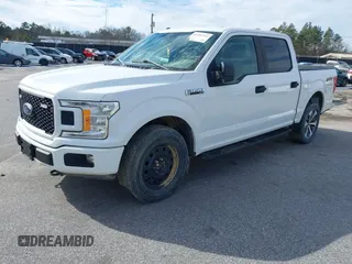 2019 Ford F-150 XL with VIN 1FTEW1E51KFC52807, listed as a IAAI auction lot 41383212 with 124,244 mi miles and . Bid and sale history available at DreamBid. Image 17.
