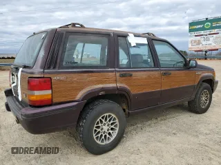 1993 Jeep Grand Wagoneer z VIN 1J4GZ88Y6PC711184, wystawiony jako Copart lot #46785895 z przebiegiem 280 127 mil mil oraz Czysty tytuł • Clean title. Historia ofert i sprzedaży dostępna na DreamBid. Obrazek 3.
