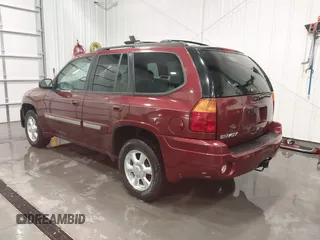 2005 GMC Envoy SLT with VIN 1GKDT13S752214687, listed as a IAAI auction lot 41421248 with 145,388 mi miles. Bid and sale history available at carsss.com. Image 3.