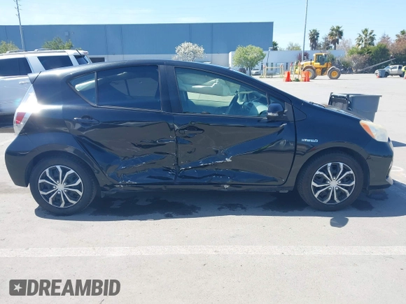 2012 Toyota Prius c One with VIN JTDKDTB36C1527223, listed as a IAAI auction lot 42002927 with 138,176 mi miles. Bid and sale history available at carsss.com. Image 13.