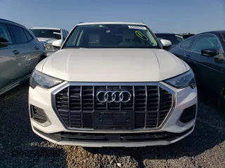 2020 Audi Q3 Premium with VIN WA1AECF32L1031641, listed as a Copart auction lot 60266275 with 43,730 mi miles and Salvage title. Bid and sale history available at DreamBid. Image 5.