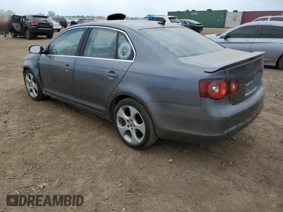 2008 Volkswagen Jetta SE z VIN 3VWRM71K08M099347, wystawiony jako Copart lot #57061795 z przebiegiem 129 225 mil mil oraz Szkoda całkowita • Salvage title. Historia ofert i sprzedaży dostępna na DreamBid. Obrazek 2.