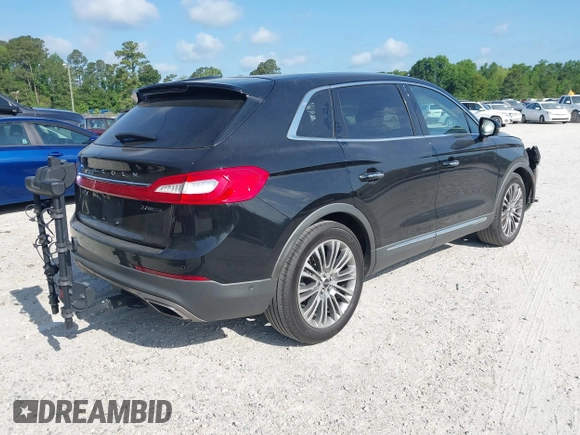 2016 Lincoln MKX Reserve with VIN 2LMTJ6LP9GBL27835, listed as a IAAI auction lot 42175905 with 87,541 mi miles. Bid and sale history available at carsss.com. Image 4.