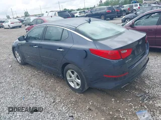 2015 Kia Optima LX z VIN KNAGM4A74F5575202, wystawiony jako IAAI lot #42247021 z przebiegiem 160 023 mil mil oraz . Historia ofert i sprzedaży dostępna na DreamBid. Obrazek 3.