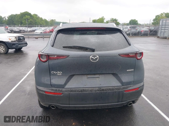 2023 Mazda CX-30 S Carbon Edition with VIN 3MVDMBCM9PM574358, listed as a IAAI auction lot 42105931 with 55,975 mi miles and . Bid and sale history available at DreamBid. Image 17.