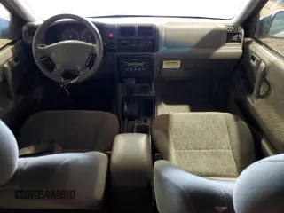 2003 Isuzu Rodeo with VIN 4S2CK58W834304403, listed as a Copart auction lot 86026704 with 62,011 mi miles and Clean Title. Bid and sale history available at DreamBid. Image 8.
