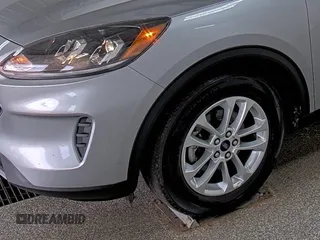 2022 Ford Escape SE z VIN 1FMCU0G61NUB33373, wystawiony jako IAAI lot #42791529 z przebiegiem 56 067 mil mil oraz . Historia ofert i sprzedaży dostępna na DreamBid. Obrazek 28.